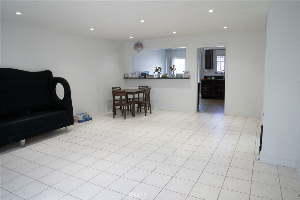 14802 Newport Avenue, Unit 2B Tustin, CA 92780 - Photo 2 of 13 a view of kitchen with furniture and refrigerator