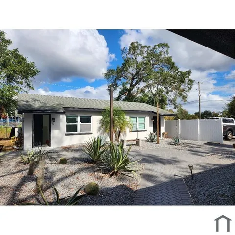 a black and white photo of a house