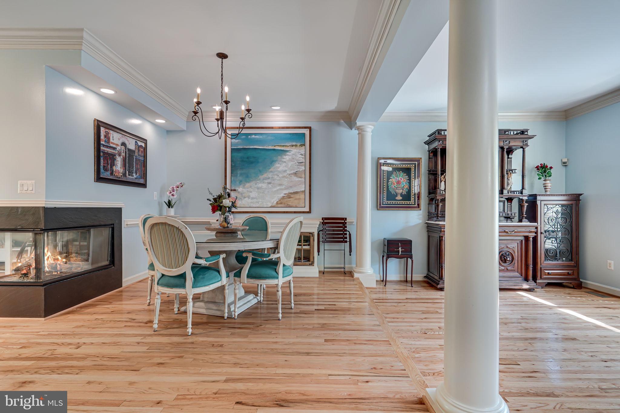 150 Rees Place Falls Church, VA 22046 - Photo 11 of 47 a dining room with furniture a chandelier and wooden floor