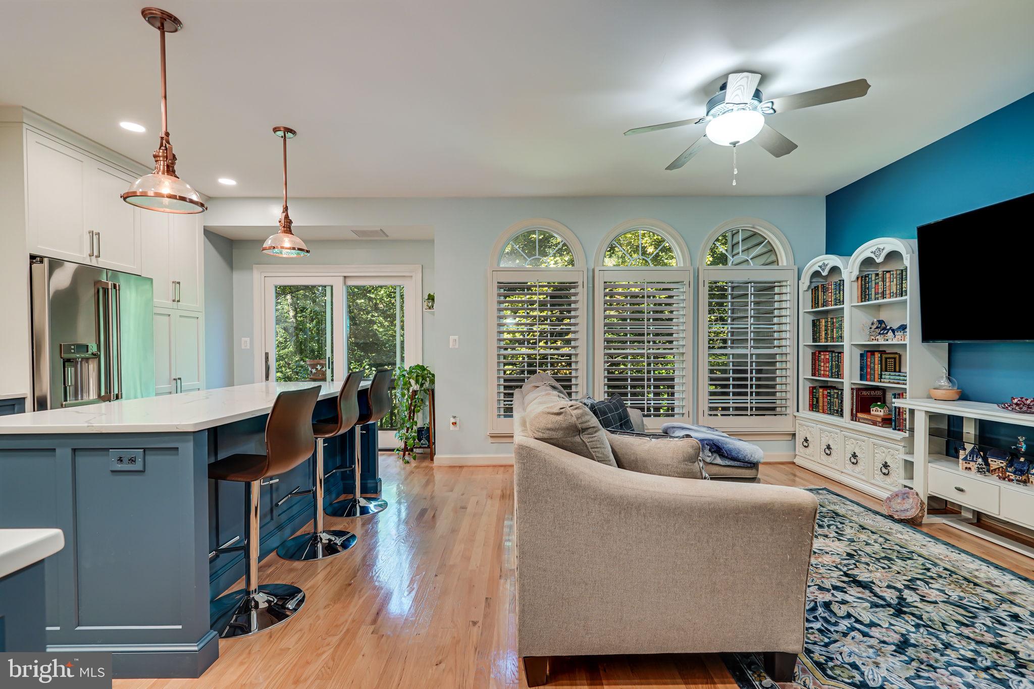 150 Rees Place Falls Church, VA 22046 - Photo 14 of 47 a living room with furniture a window and a flat screen tv