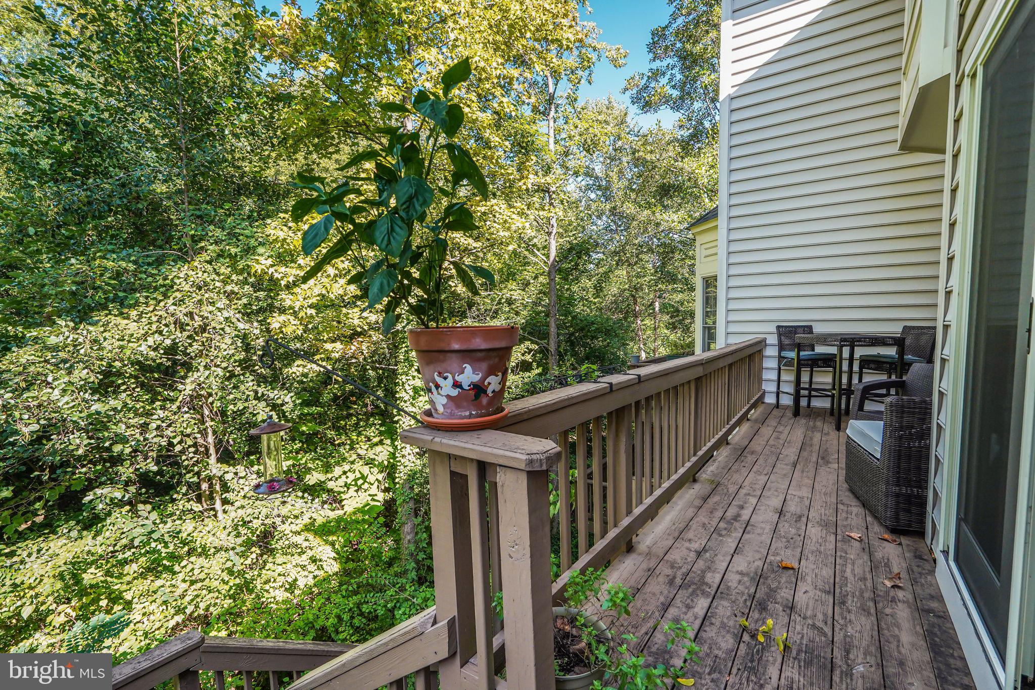 150 Rees Place Falls Church, VA 22046 - Photo 19 of 47 a balcony with wooden floor and outdoor seating