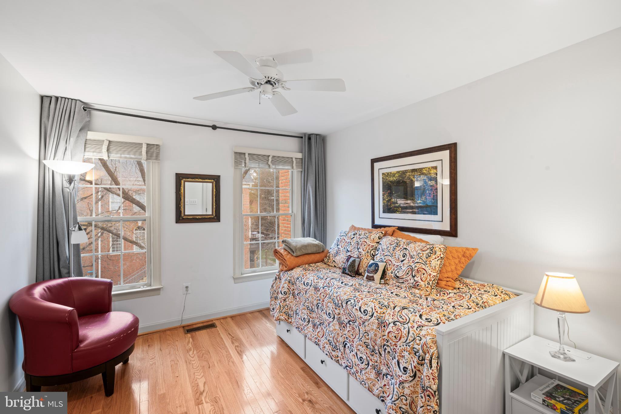 150 Rees Place Falls Church, VA 22046 - Photo 31 of 47 a bedroom with a bed and wooden floor