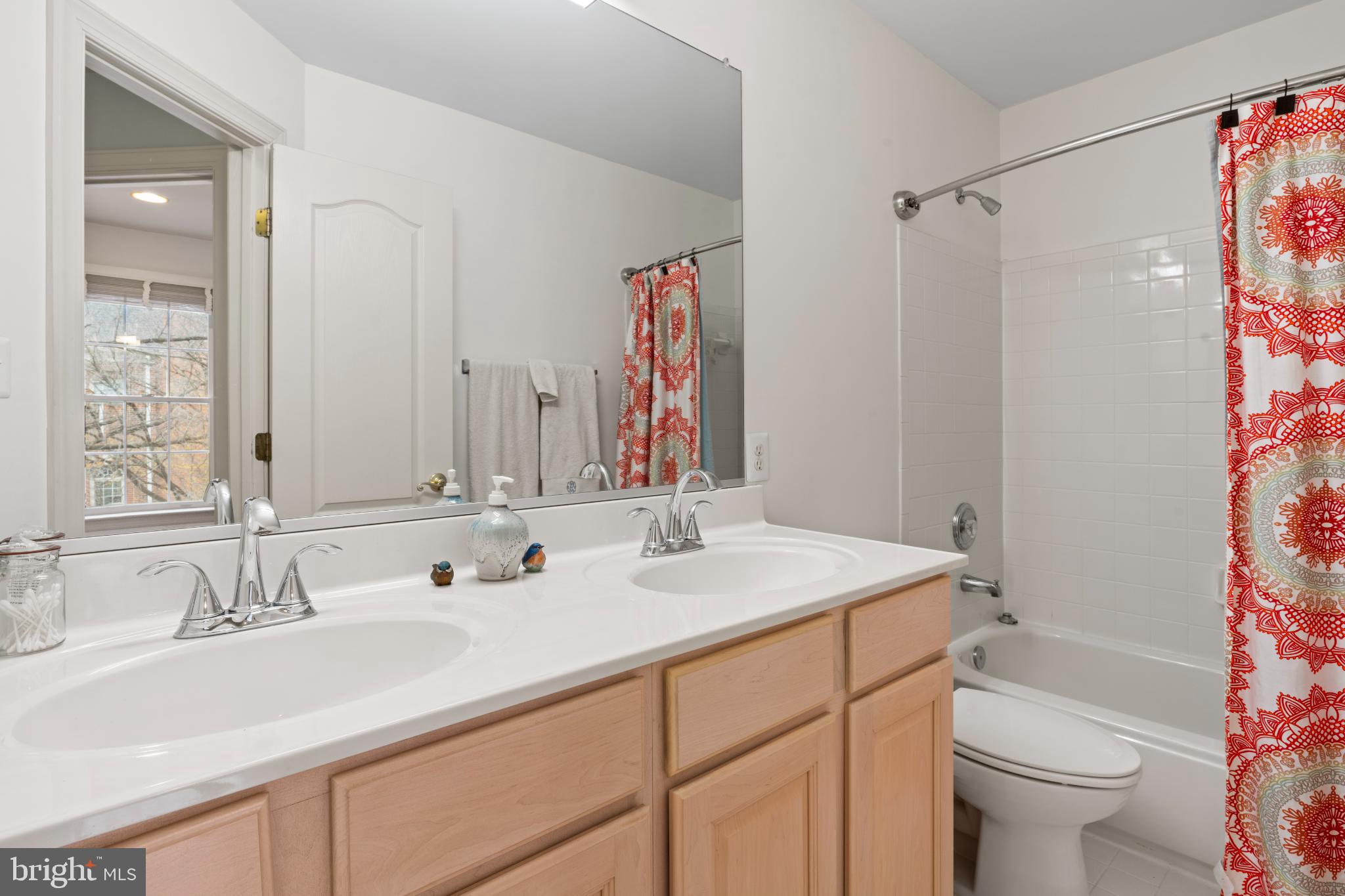150 Rees Place Falls Church, VA 22046 - Photo 37 of 47 a bathroom with a sink and a mirror