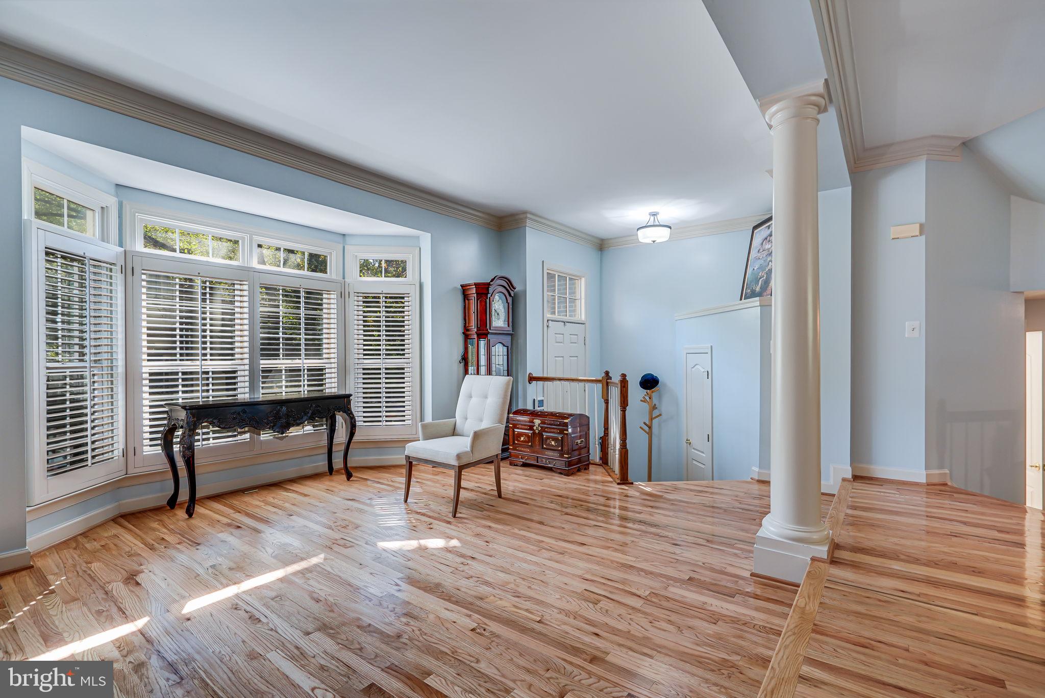150 Rees Place Falls Church, VA 22046 - Photo 4 of 47 a living room with furniture and a wooden floor