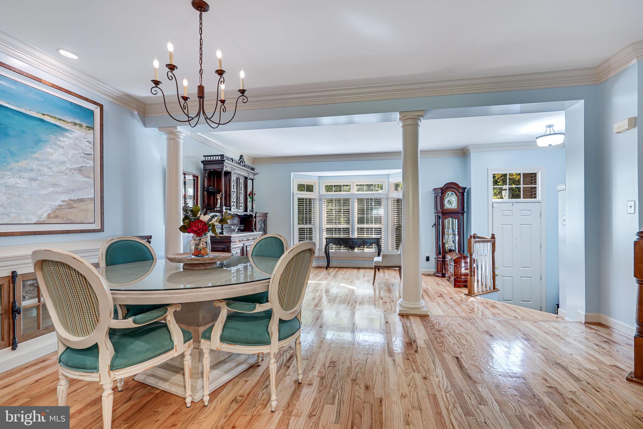 150 Rees Place Falls Church, VA 22046 - Photo 8 of 47 a view of a dining room with furniture wooden floor and chandelier