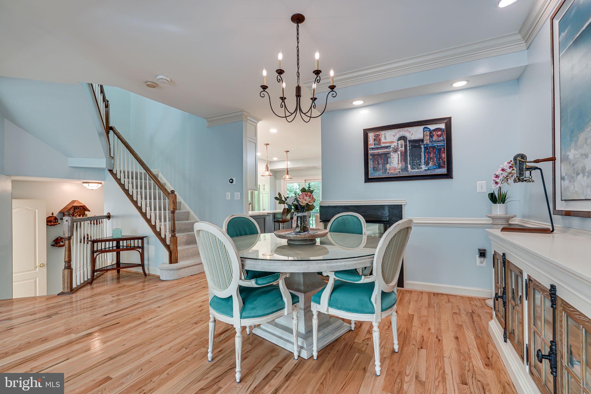 150 Rees Place Falls Church, VA 22046 - Photo 10 of 47 a view of a dining room with furniture wooden floor and chandelier
