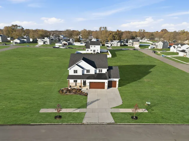 front view of a house with a yard