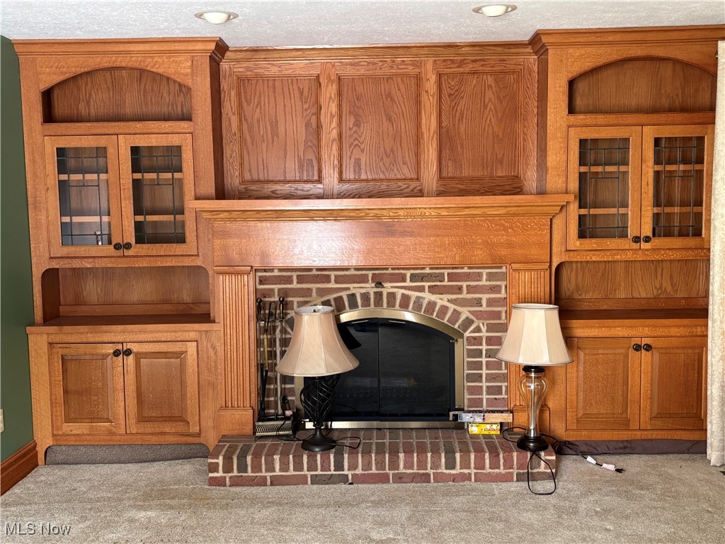 11592 Taylor Wells Road Chardon, OH 44024 - Photo 16 of 37 Living room fireplace and builtins