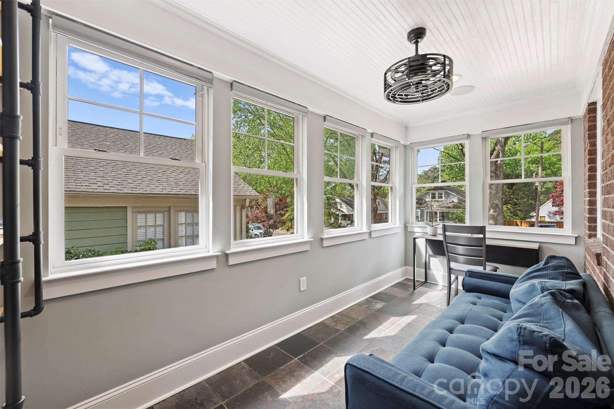 1734 Club Road Charlotte, NC 28205 - Photo 17 of 41 a living room with furniture and a large window