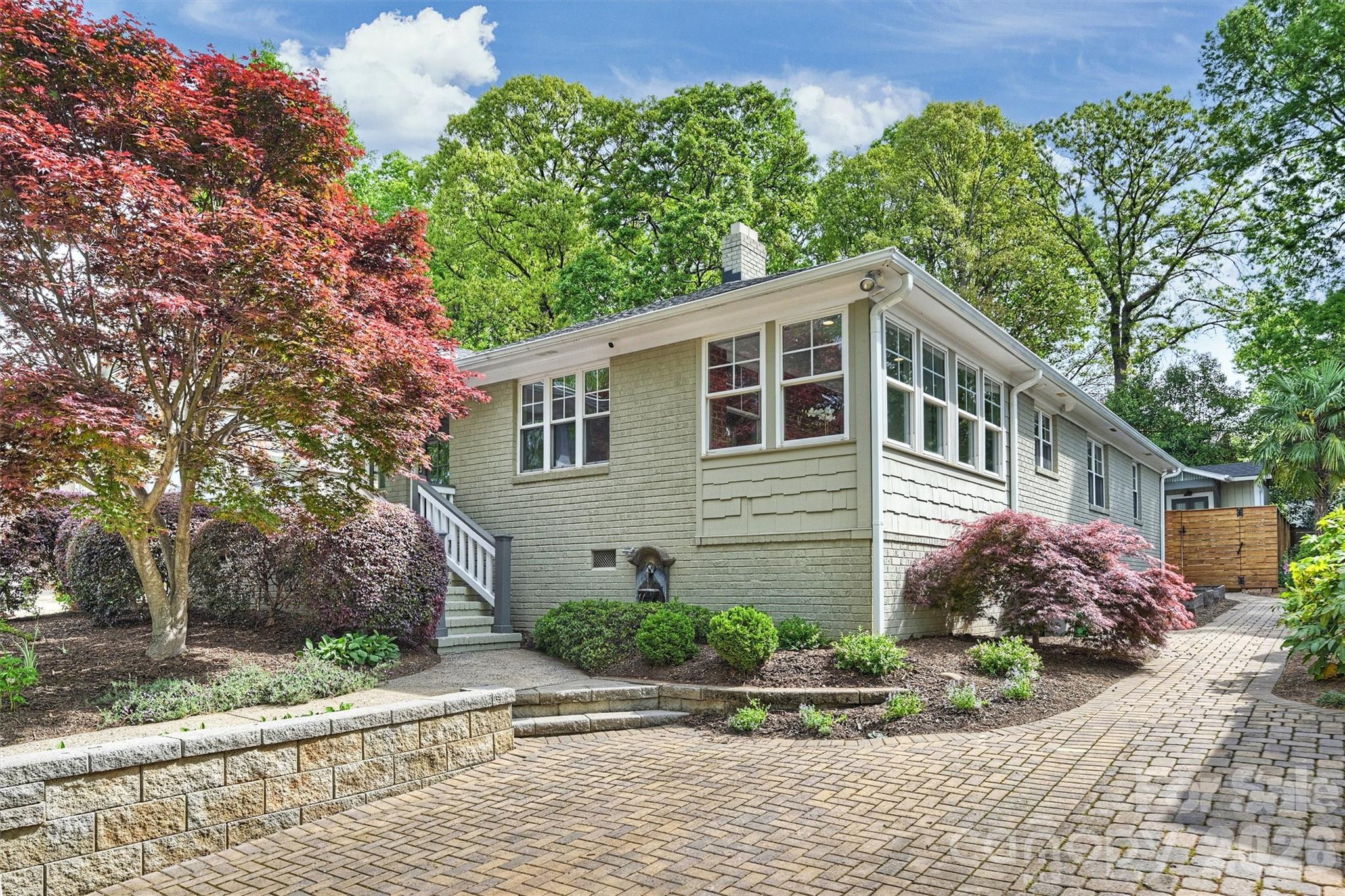 1734 Club Road Charlotte, NC 28205 - Photo 2 of 41 a front view of a house with a yard