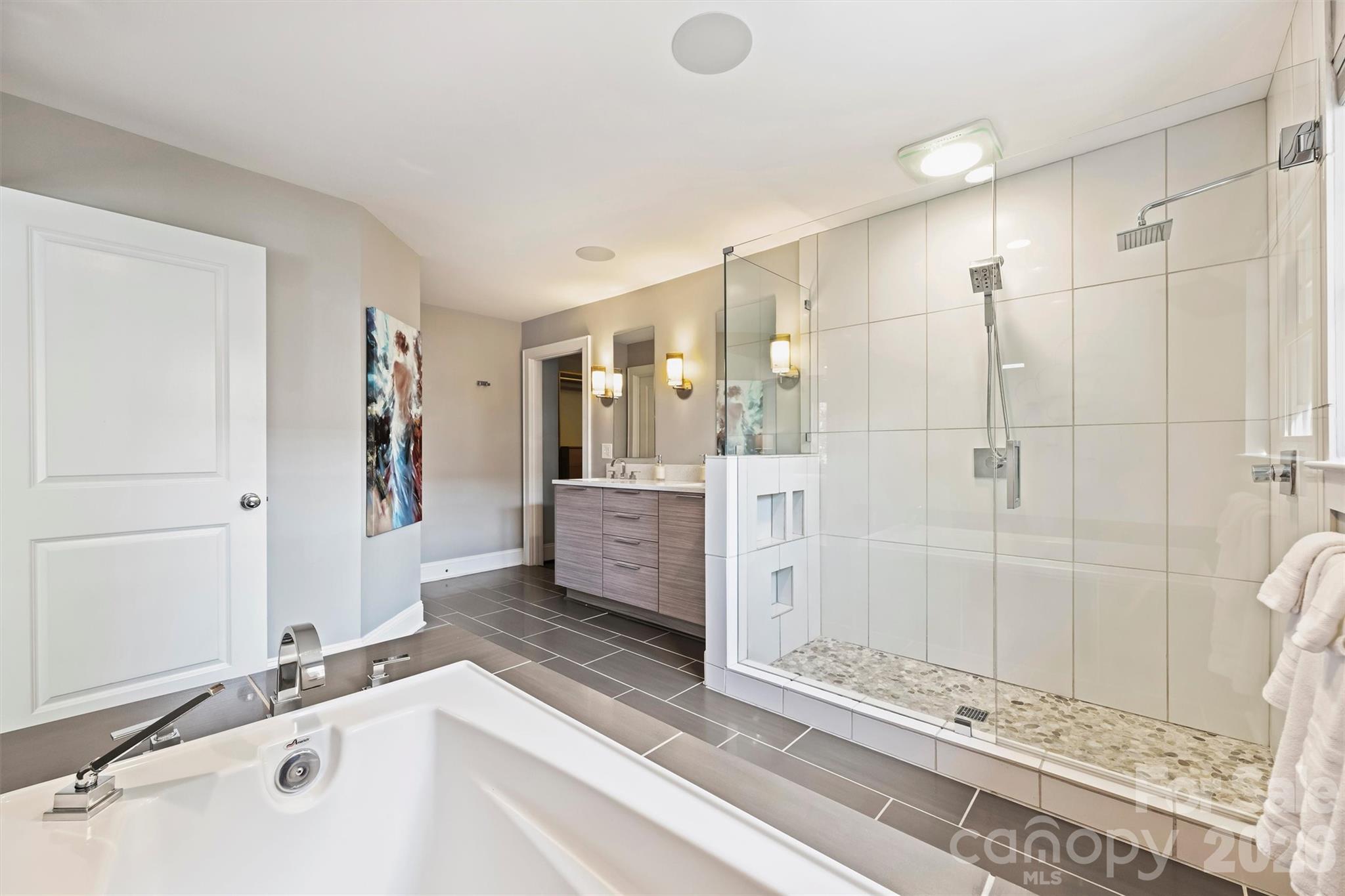 1734 Club Road Charlotte, NC 28205 - Photo 22 of 41 a bathroom with a tub sink shower and mirror