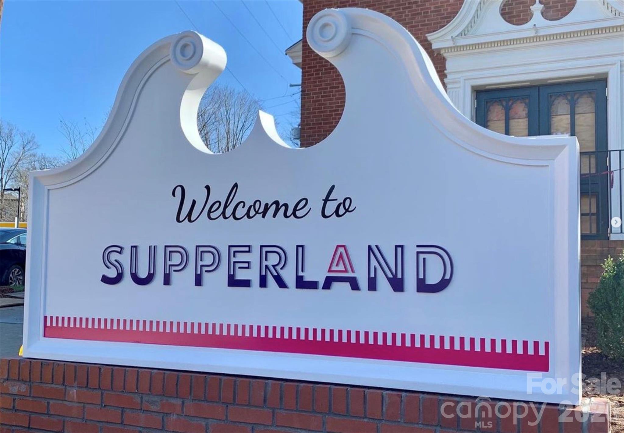 1734 Club Road Charlotte, NC 28205 - Photo 38 of 41 a sign that is on the wall of building