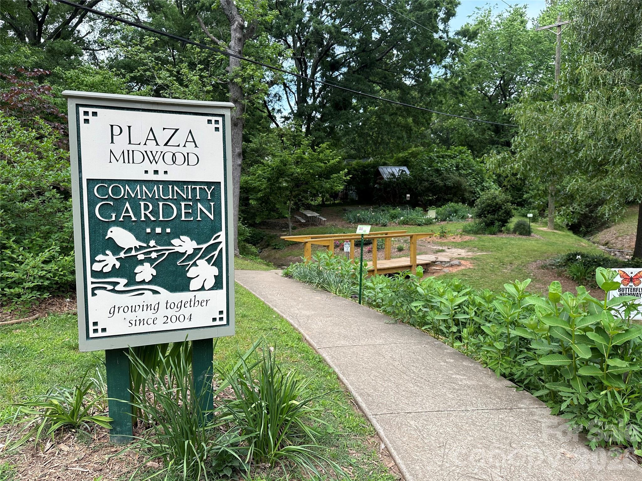 1734 Club Road Charlotte, NC 28205 - Photo 40 of 41 a sign on the side of a building