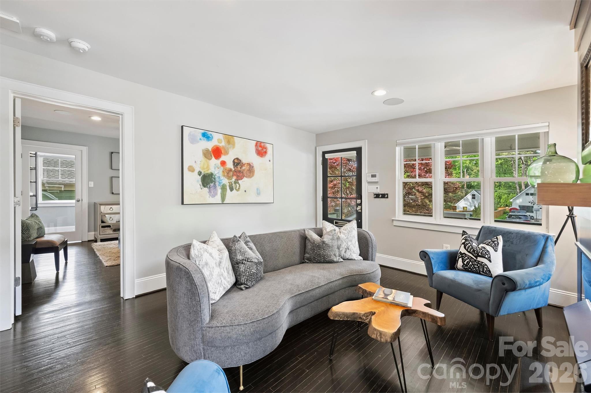 1734 Club Road Charlotte, NC 28205 - Photo 6 of 41 a living room with furniture and floor to ceiling windows