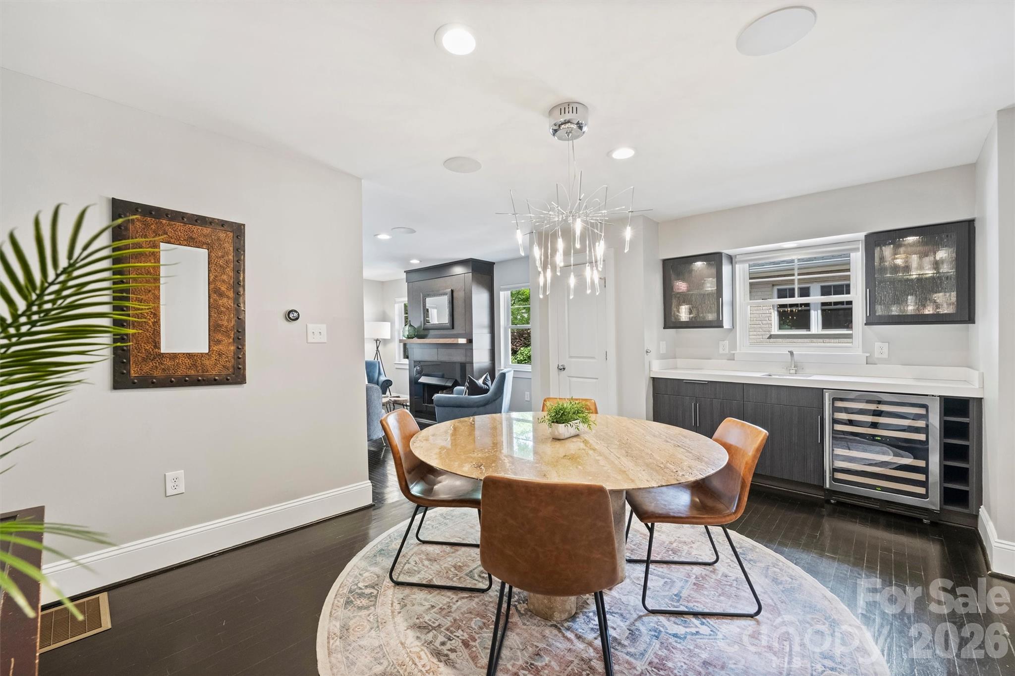 1734 Club Road Charlotte, NC 28205 - Photo 7 of 41 a view of a dining room with furniture and chandelier