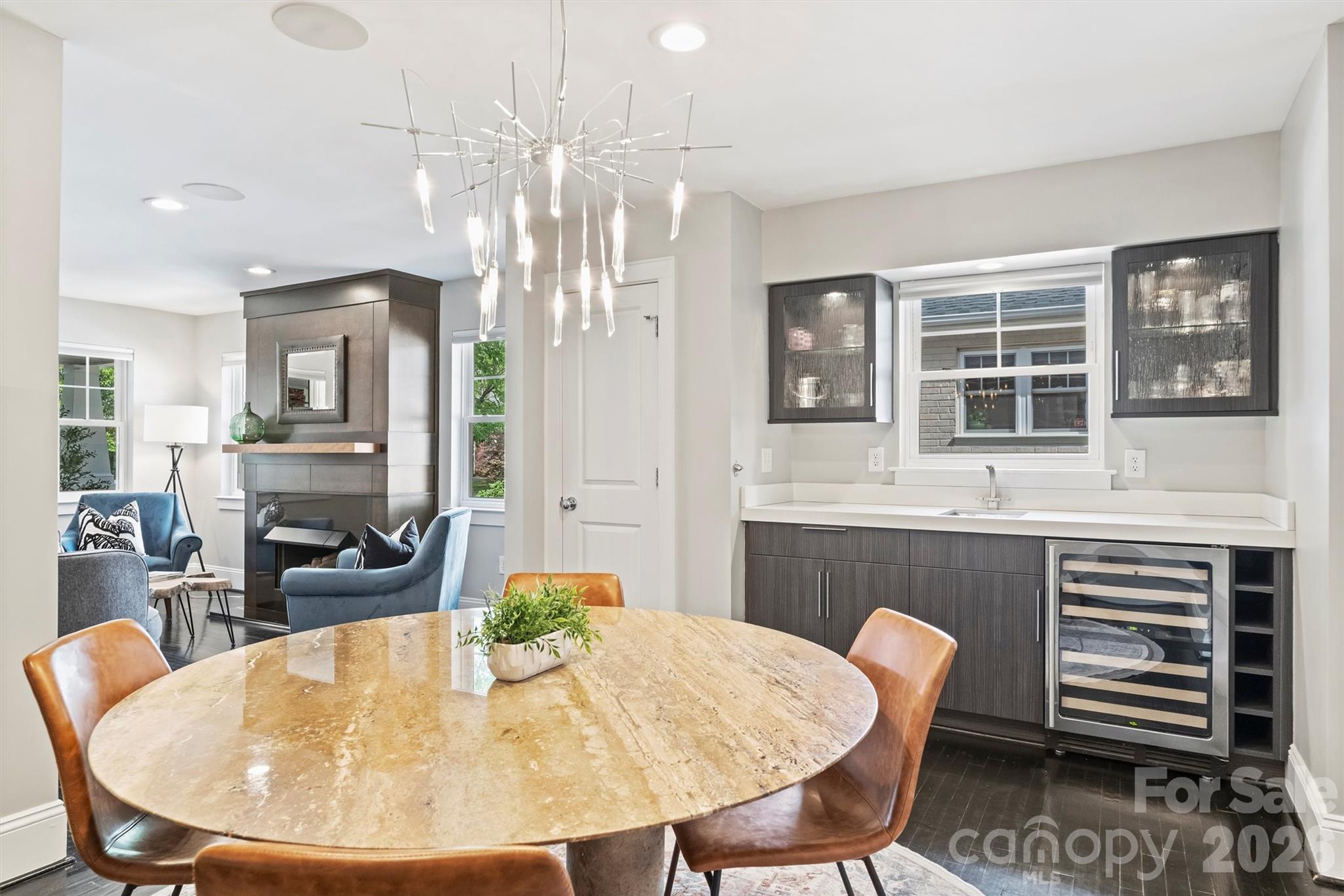1734 Club Road Charlotte, NC 28205 - Photo 8 of 41 a dining room with furniture a rug and wooden floor