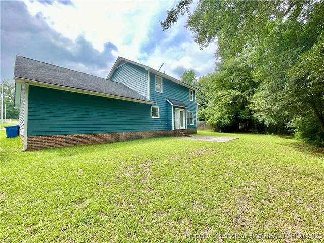 a front view of house with yard