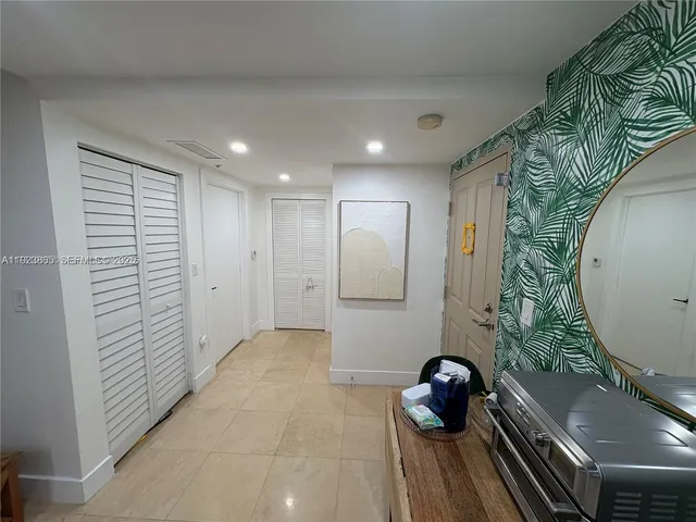 a bathroom with a sink and mirror