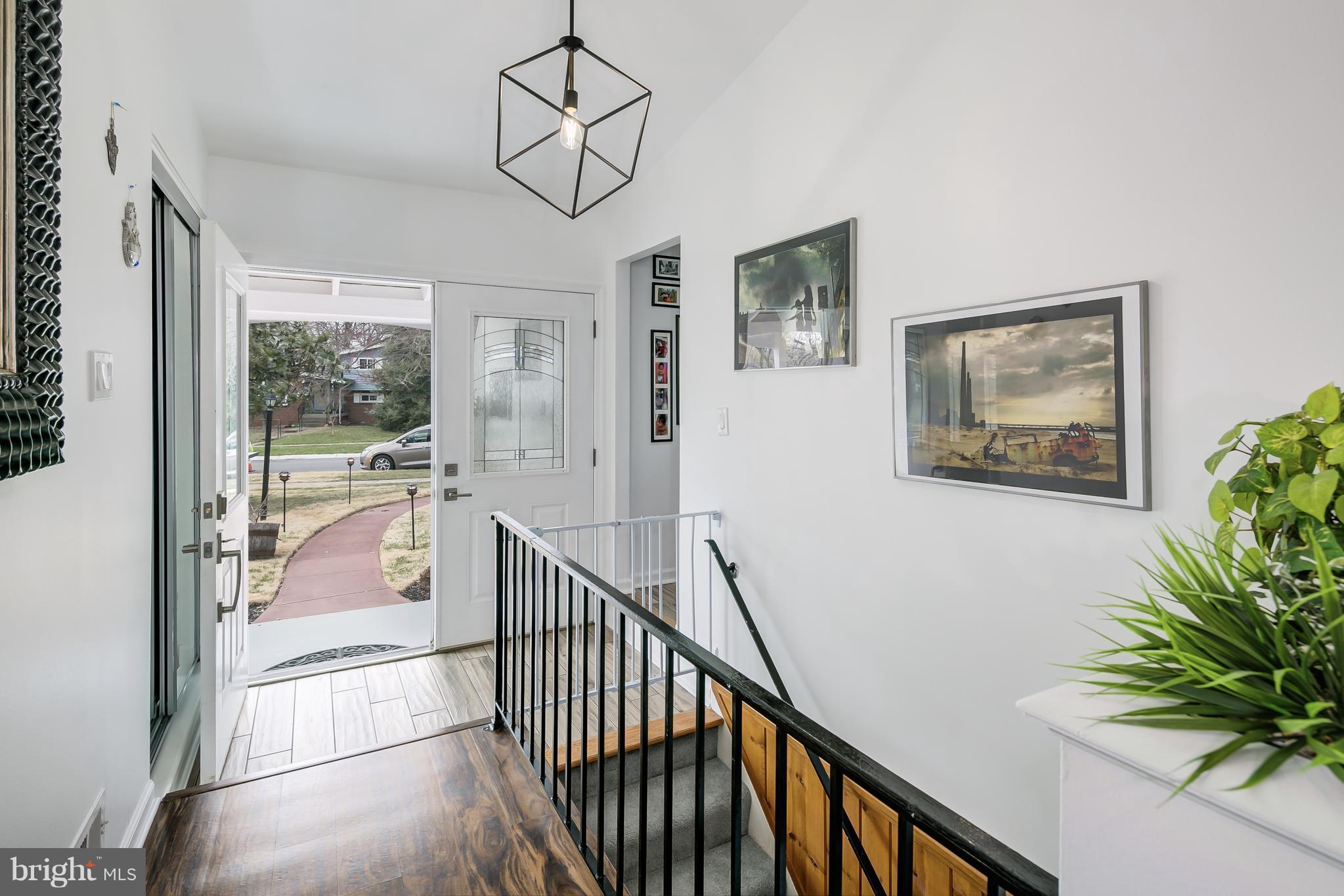 136 Claybrook Drive Silver Spring, MD 20902 - Photo 2 of 30 a view of hallway with livingroom