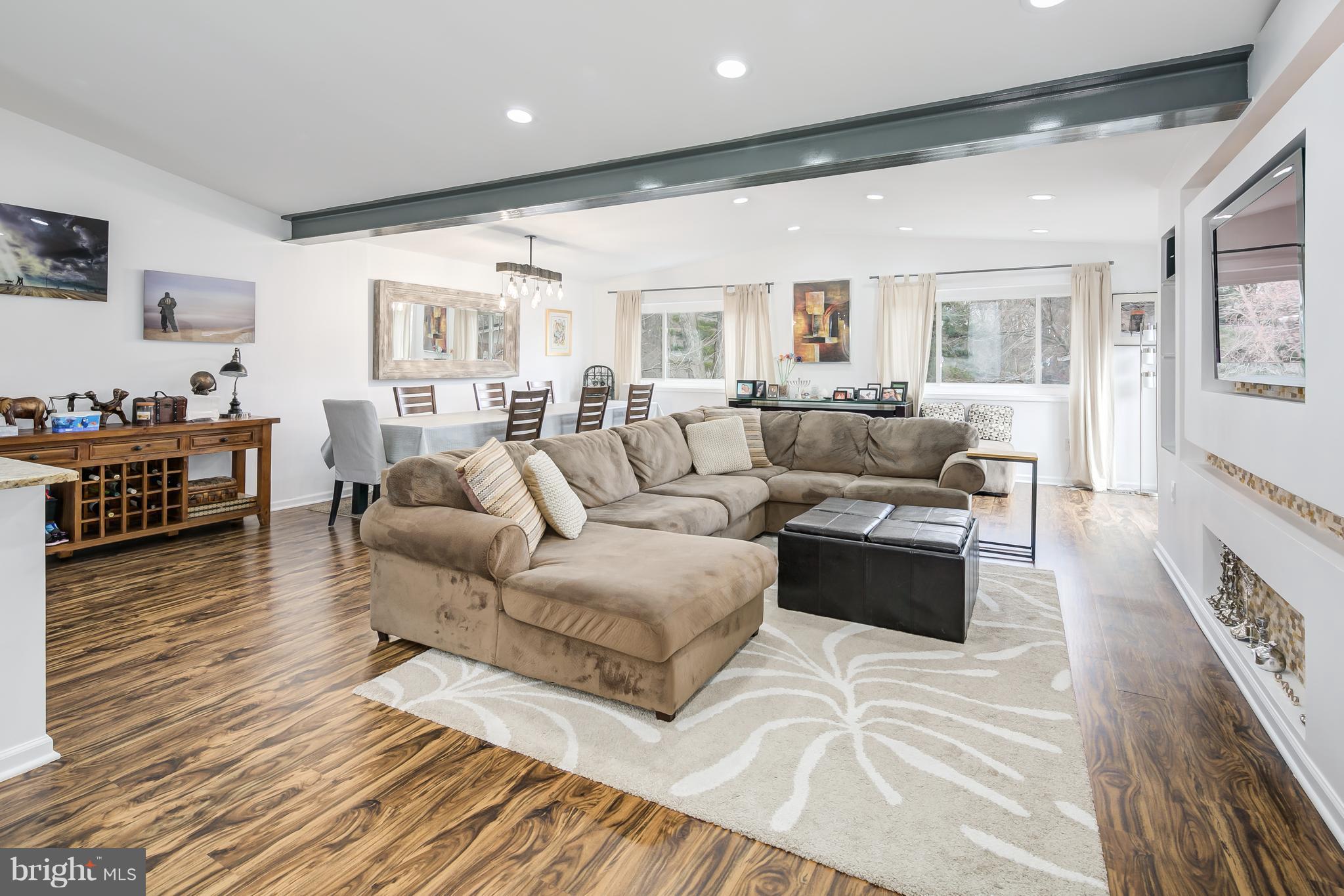 136 Claybrook Drive Silver Spring, MD 20902 - Photo 3 of 30 a living room with furniture and a large window