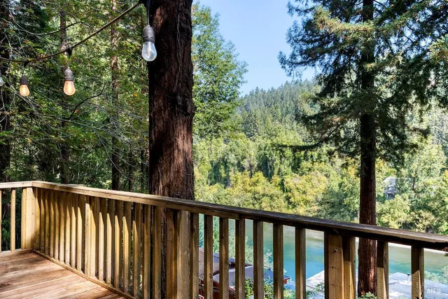 a view of balcony and yard
