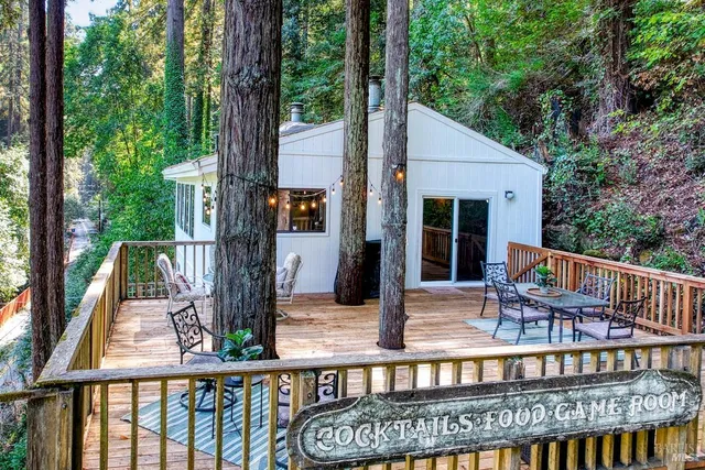 a balcony with furniture and wooden floor