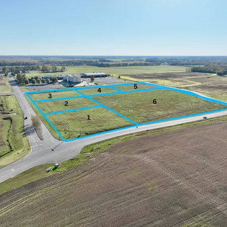 an aerial view of a tennis ground