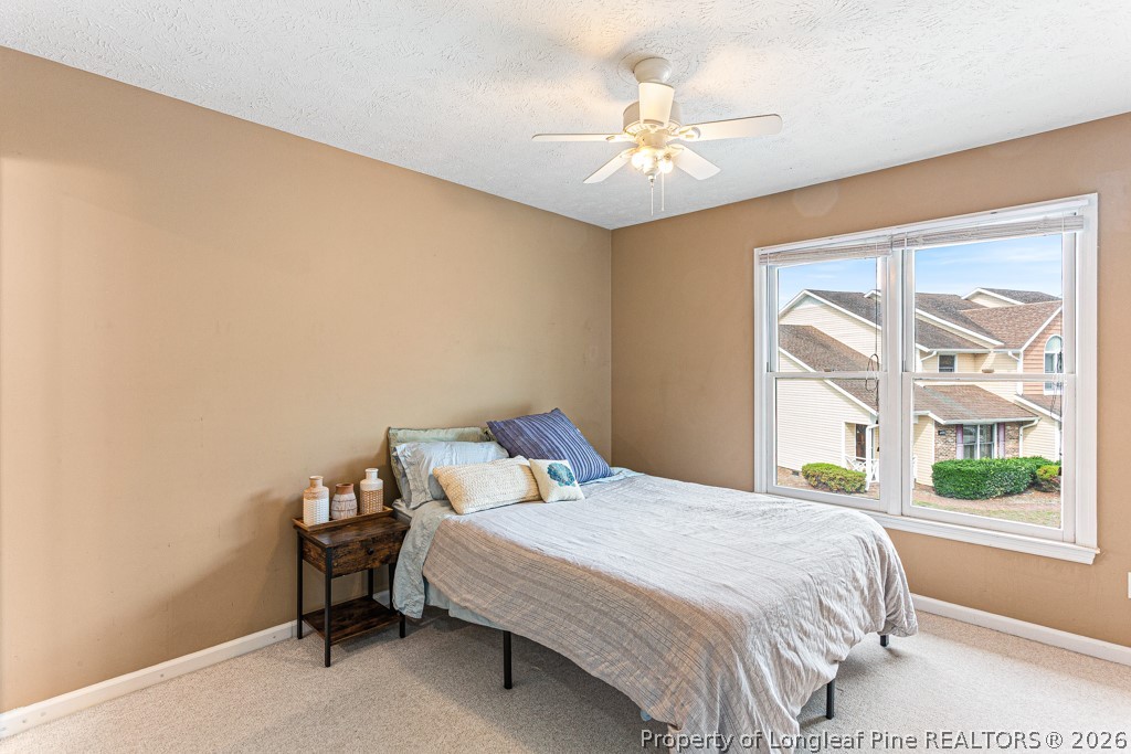 461 Lands End Road Fayetteville, NC 28314 - Photo 23 of 31 a bedroom with a bed and a window