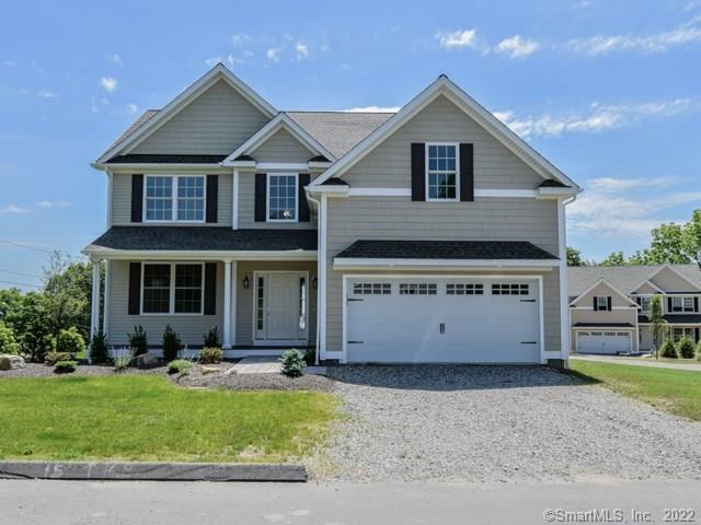 88 Perry Hill Road, Unit 1 Shelton, CT 06484 - Photo 1 of 1 a view of a house with a yard and potted plants