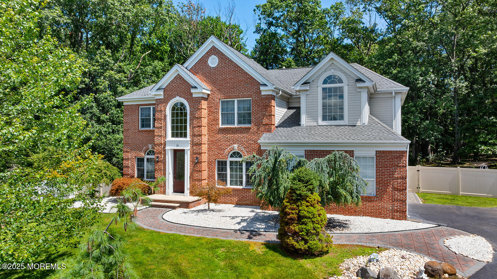 26 Chiswick Court Jackson, NJ 08527 - Photo 2 of 41 a front view of a house with a yard