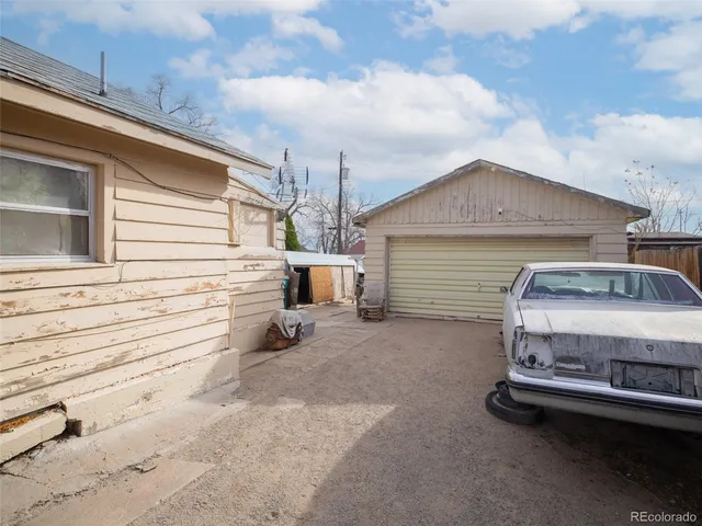 a front view of a house with a garage