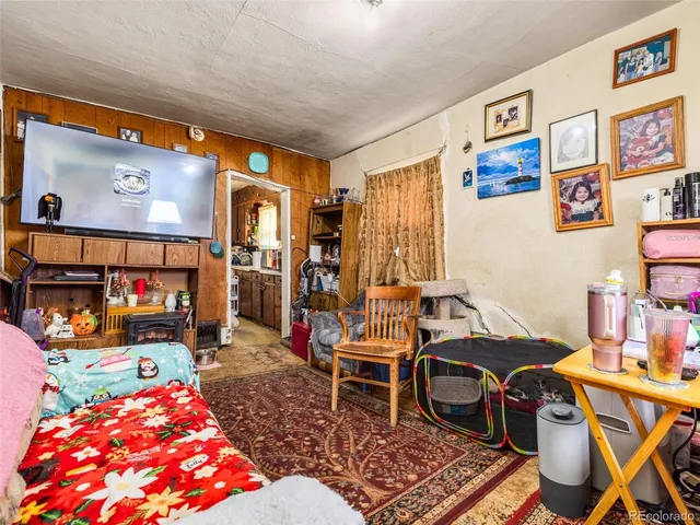 a bedroom with bed and a window