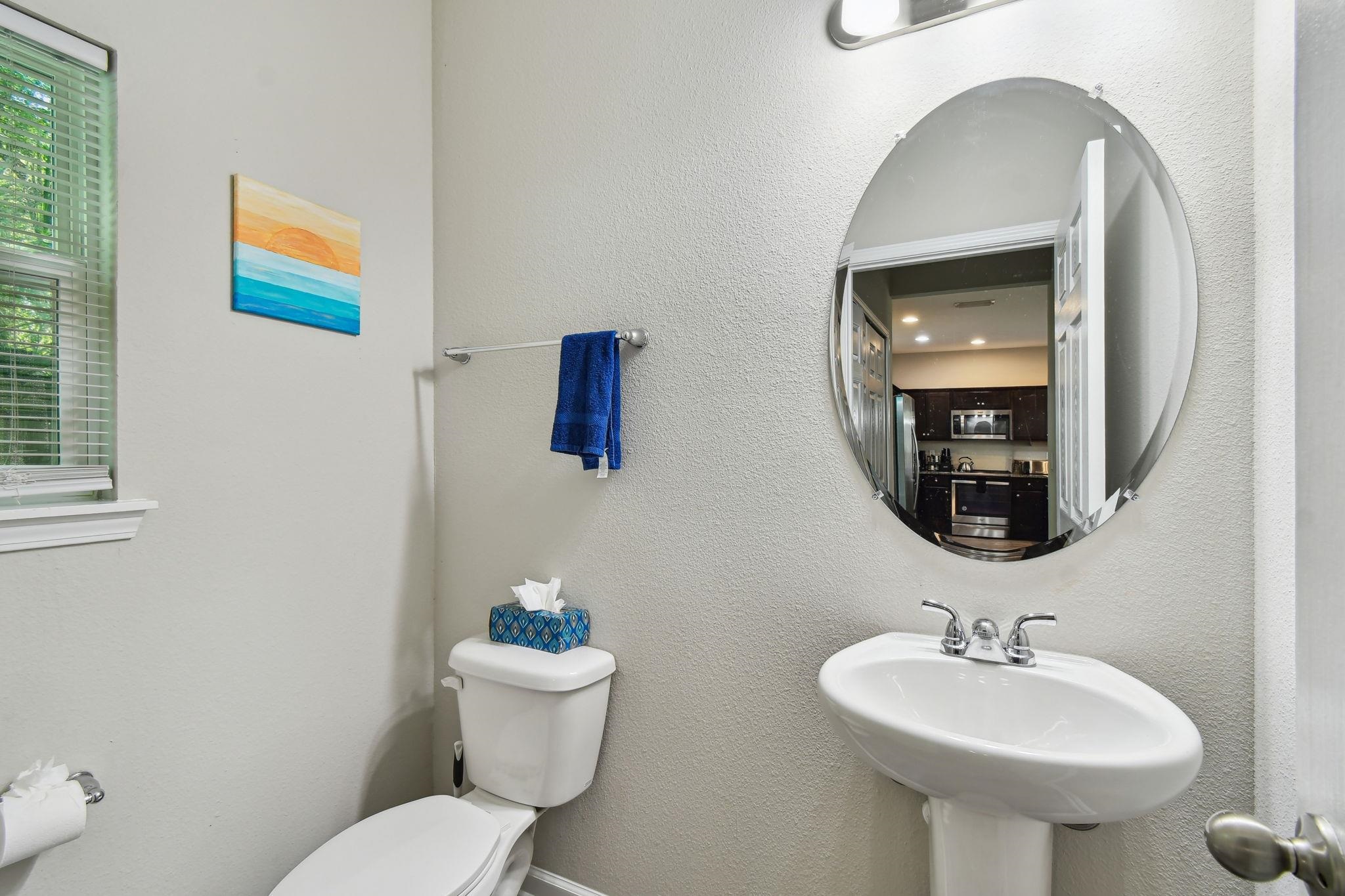 241 Columbus Street St. Augustine, FL 32084 - Photo 16 of 47 a bathroom with a toilet sink and mirror
