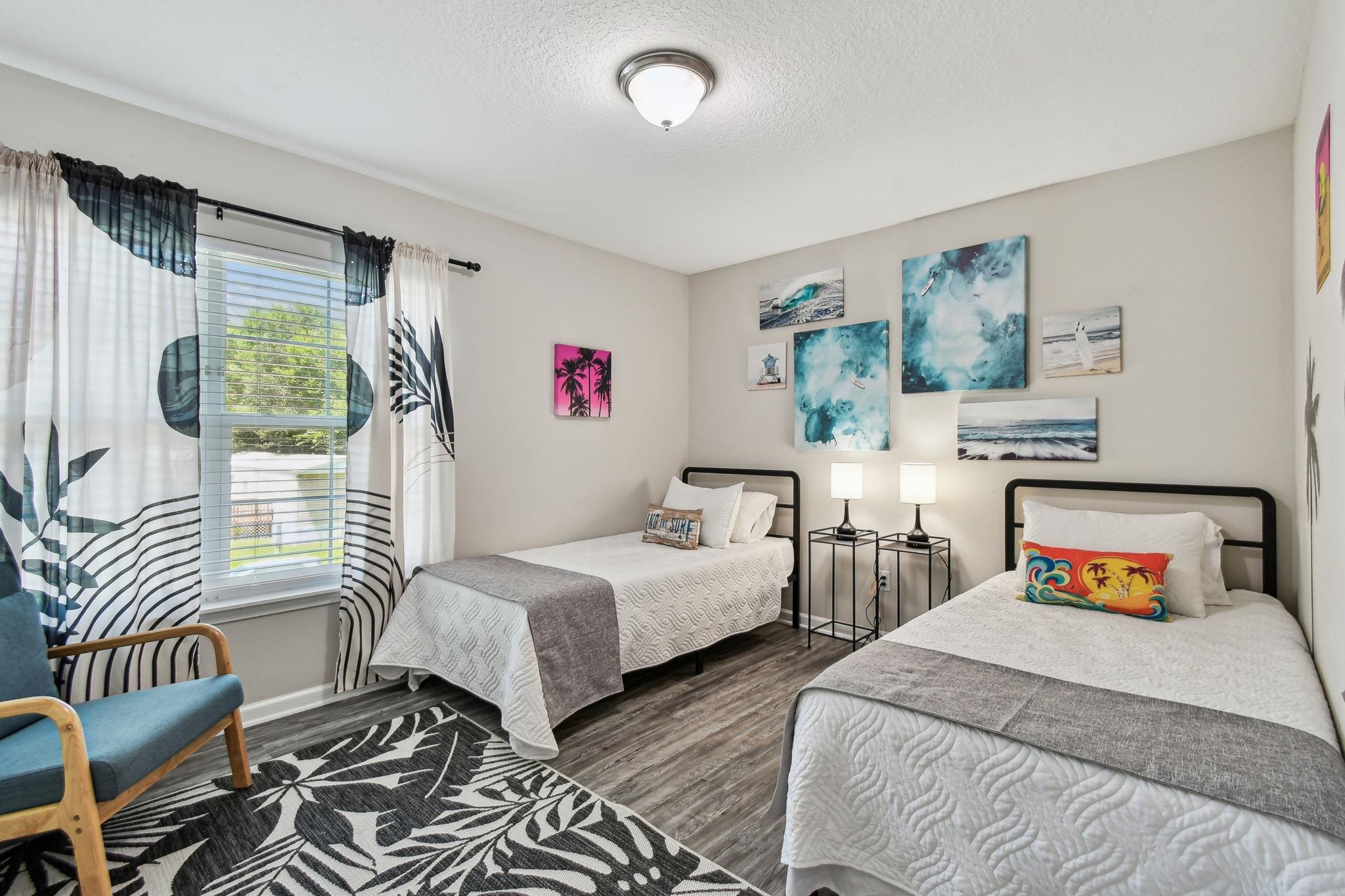 241 Columbus Street St. Augustine, FL 32084 - Photo 30 of 47 a bedroom with two beds and a couch