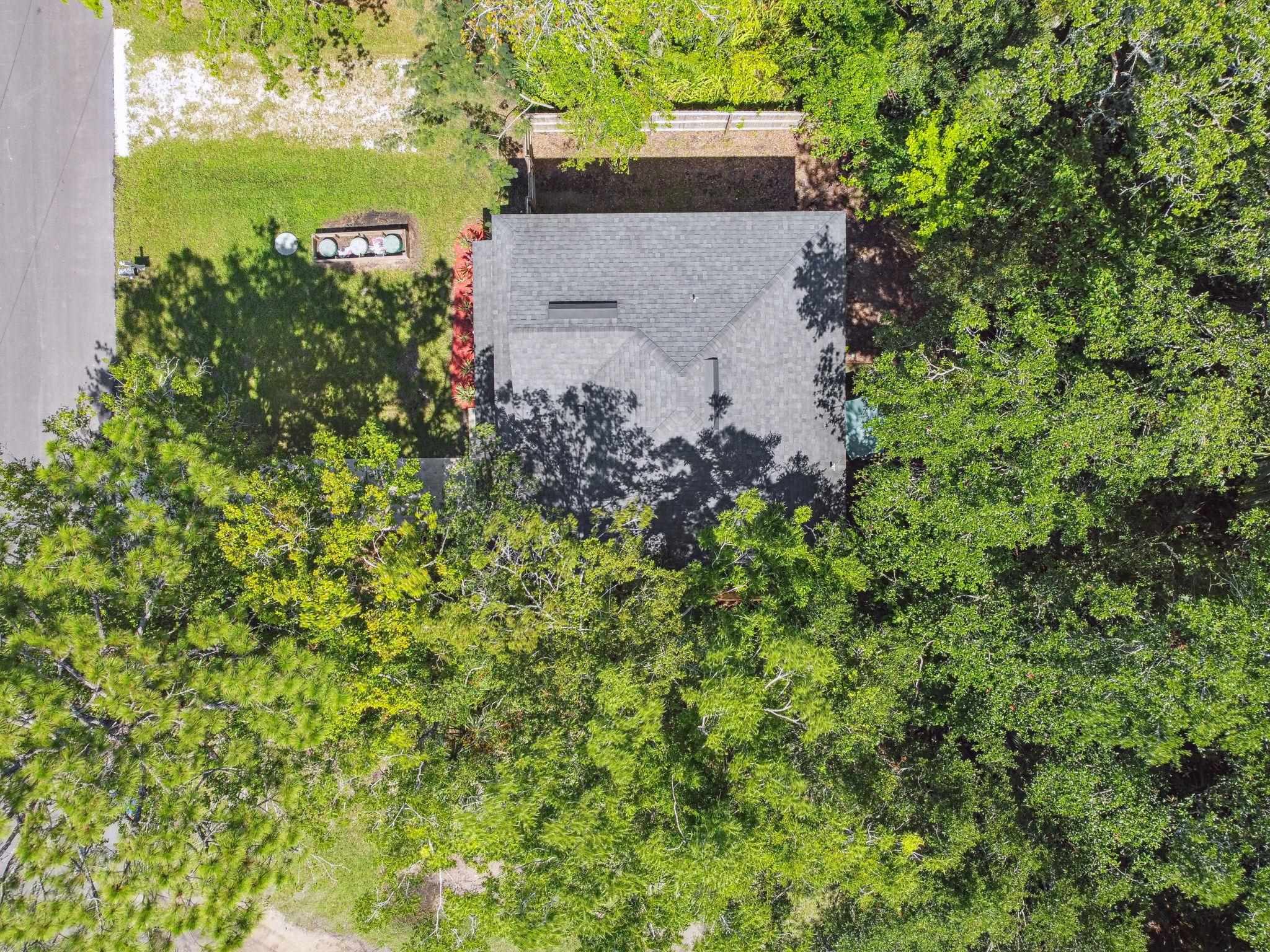 241 Columbus Street St. Augustine, FL 32084 - Photo 38 of 47 an aerial view of a house with a yard and lake view