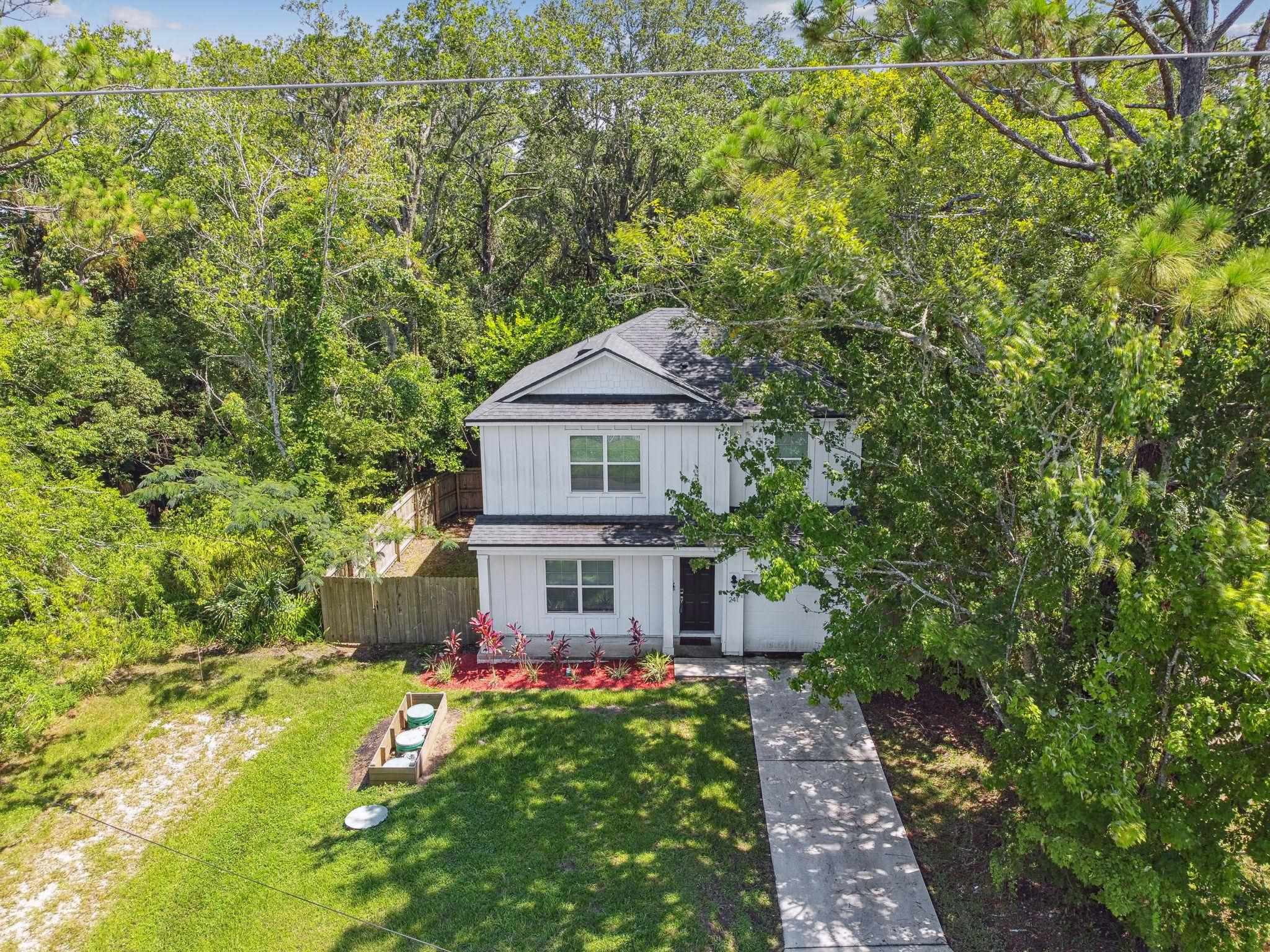 241 Columbus Street St. Augustine, FL 32084 - Photo 39 of 47 a front view of a house with garden