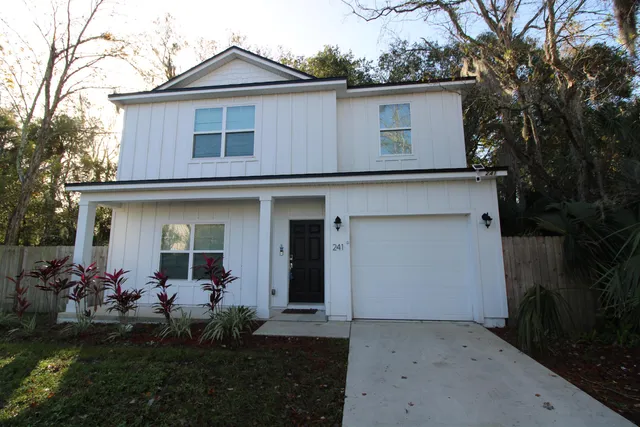 a front view of house with yard