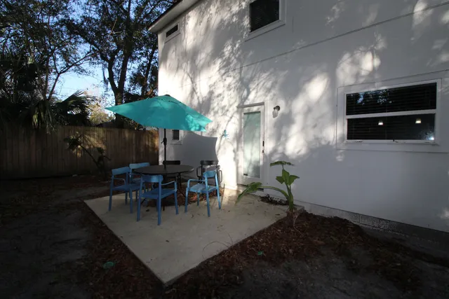 a view of a tables and chairs in patio