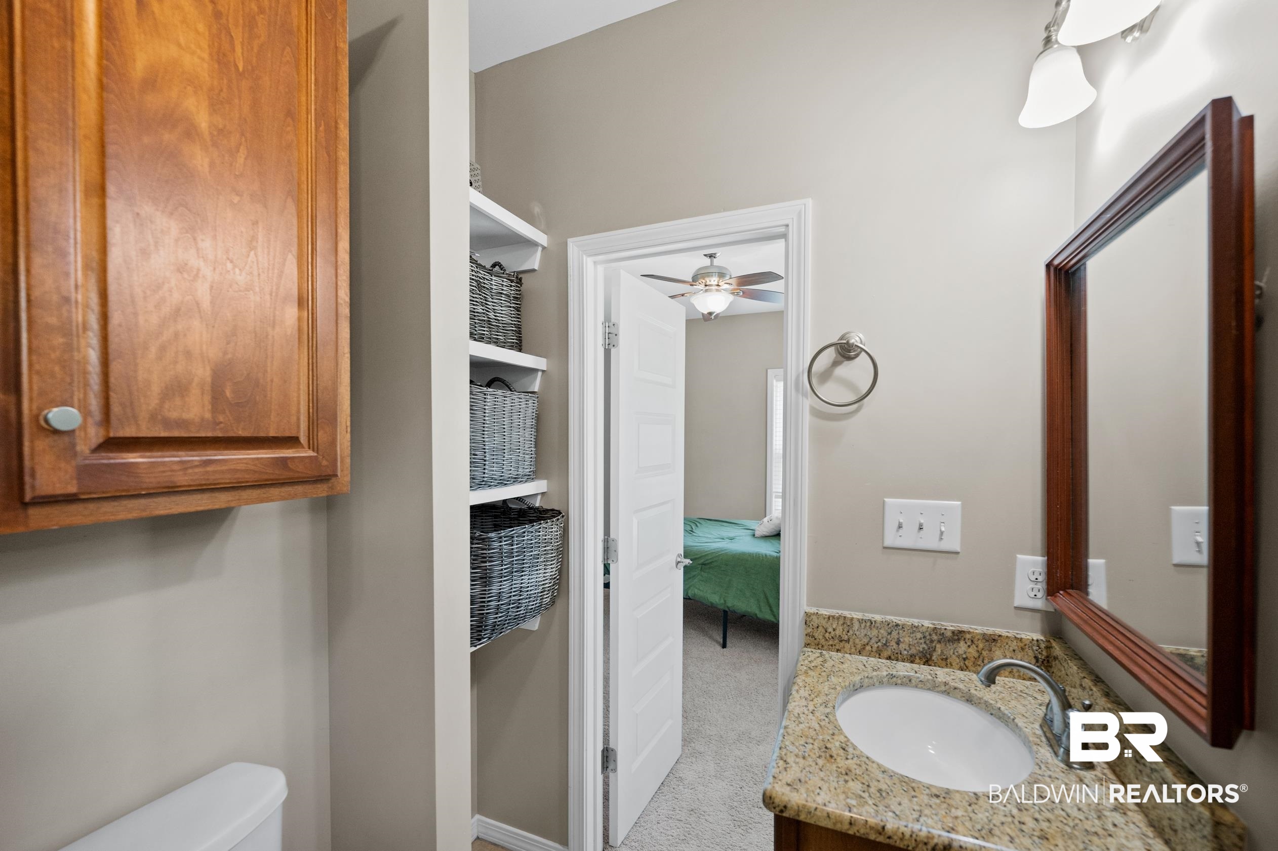 9060 Bromley Road Bay Minette, AL 36507 - Photo 46 of 63 Bathroom featuring vanity and a ceiling fan