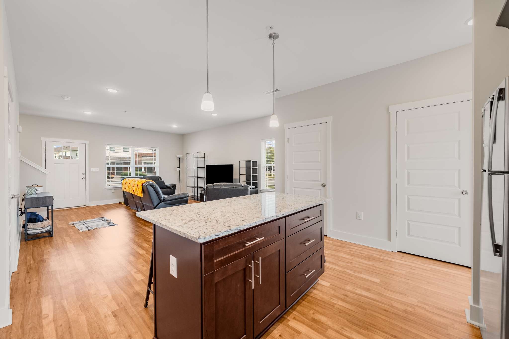 7024 Magnolia Crossings Spring Hill, TN 37174 - Photo 12 of 40 a large kitchen with a large counter top appliances and cabinets