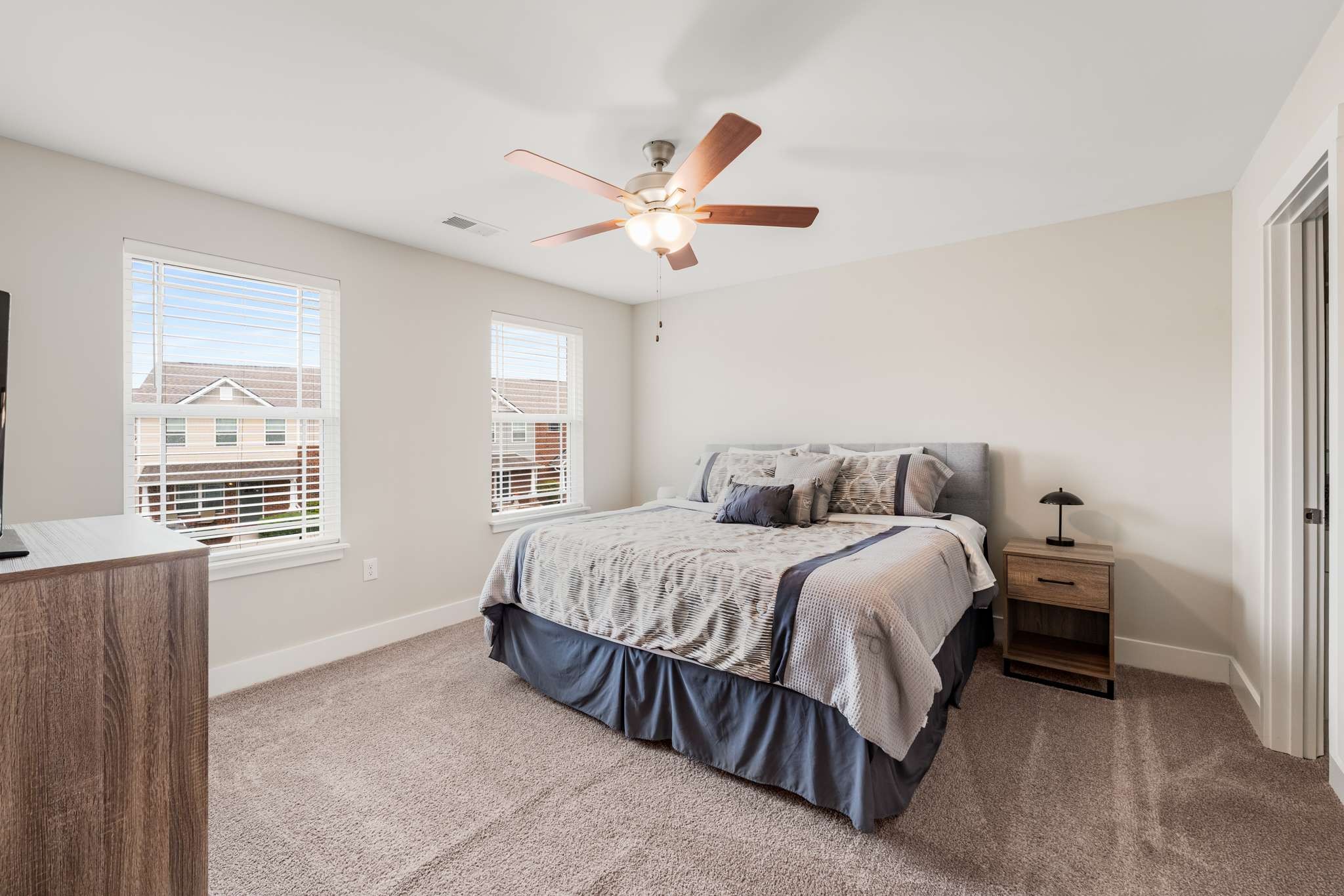 7024 Magnolia Crossings Spring Hill, TN 37174 - Photo 17 of 40 a spacious bedroom with a bed and a window