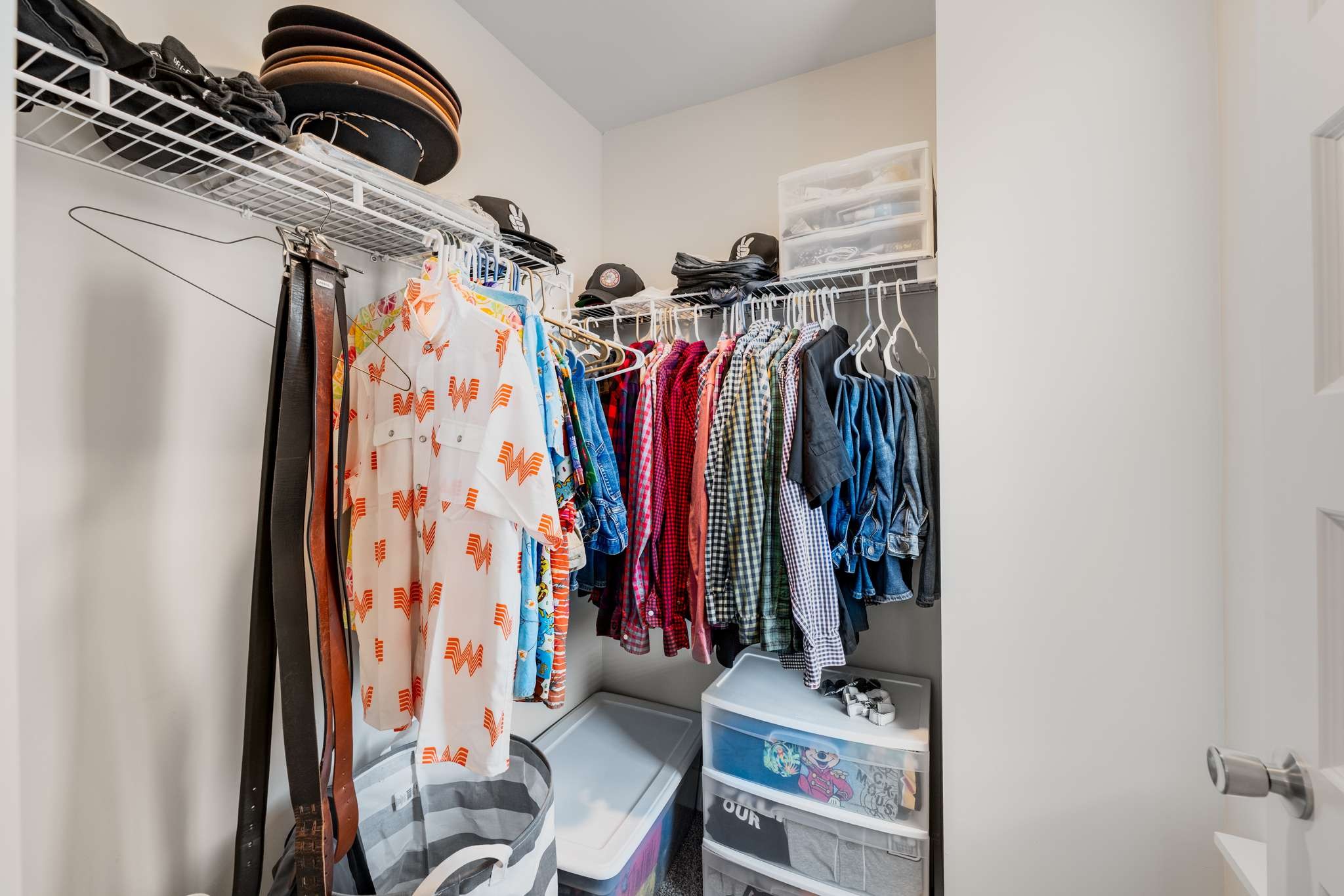 7024 Magnolia Crossings Spring Hill, TN 37174 - Photo 20 of 40 a view of walk in closet with clothes and shoes