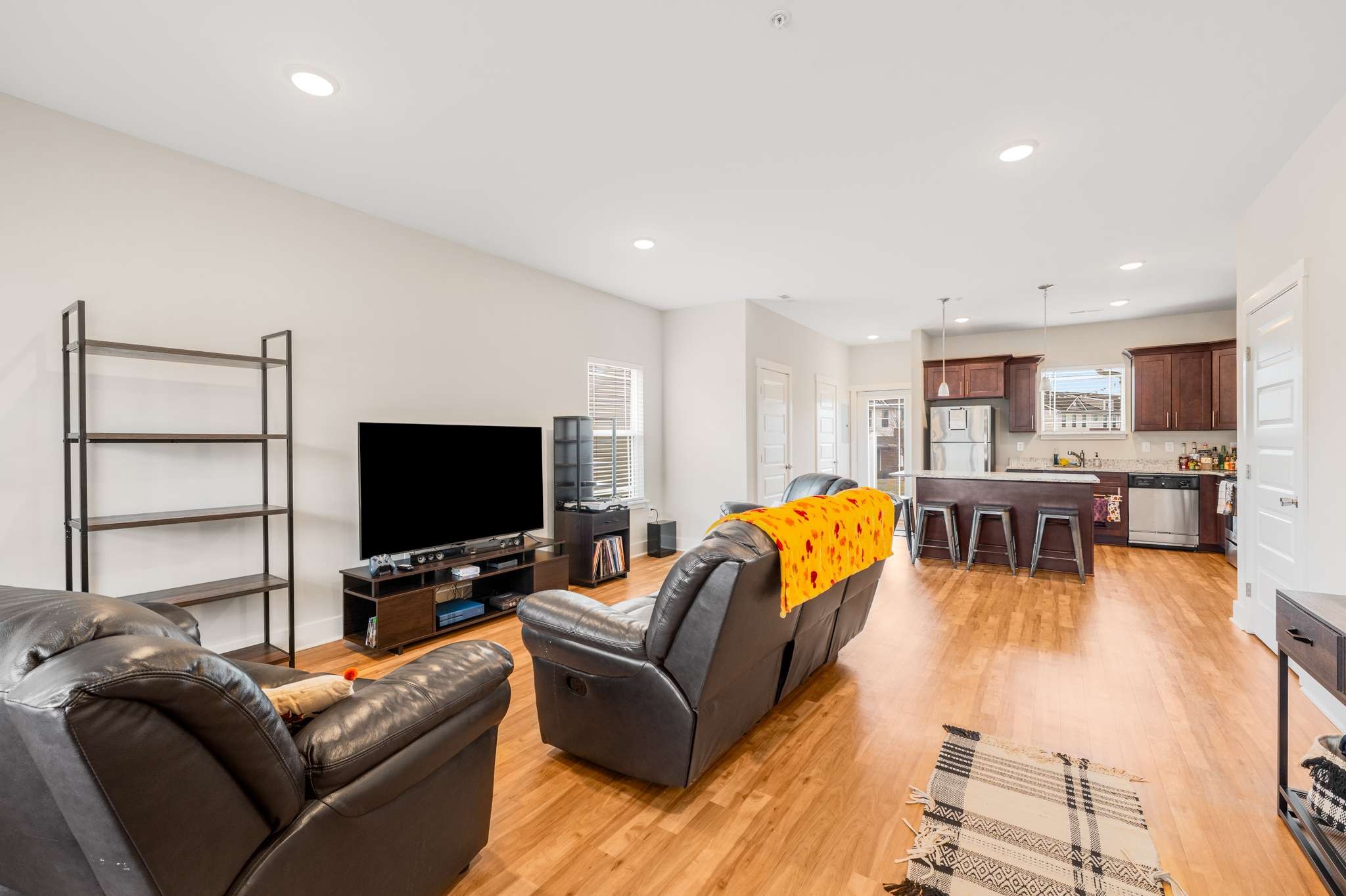 7024 Magnolia Crossings Spring Hill, TN 37174 - Photo 5 of 40 a living room with furniture and a flat screen tv