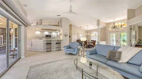 a kitchen that has a lot of cabinets in it and appliances