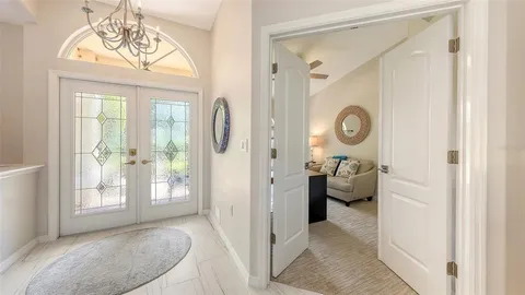 a view of a livingroom with furniture and windows