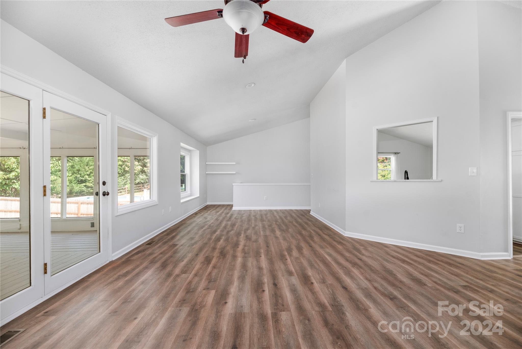 4055 Lake Shore Road South Denver, NC 28037 - Photo 10 of 47 wooden floor in an empty room with a window