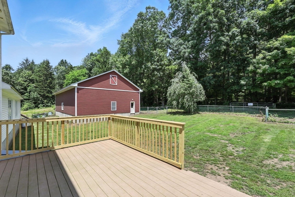 285 Lower Hampden Road Monson, MA 01057 - Photo 5 of 40 a view of house with a yard and trees