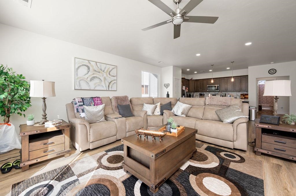 1694 Tungsten Way Fruita, CO 81521 - Photo 6 of 22 a living room with furniture and a view of kitchen