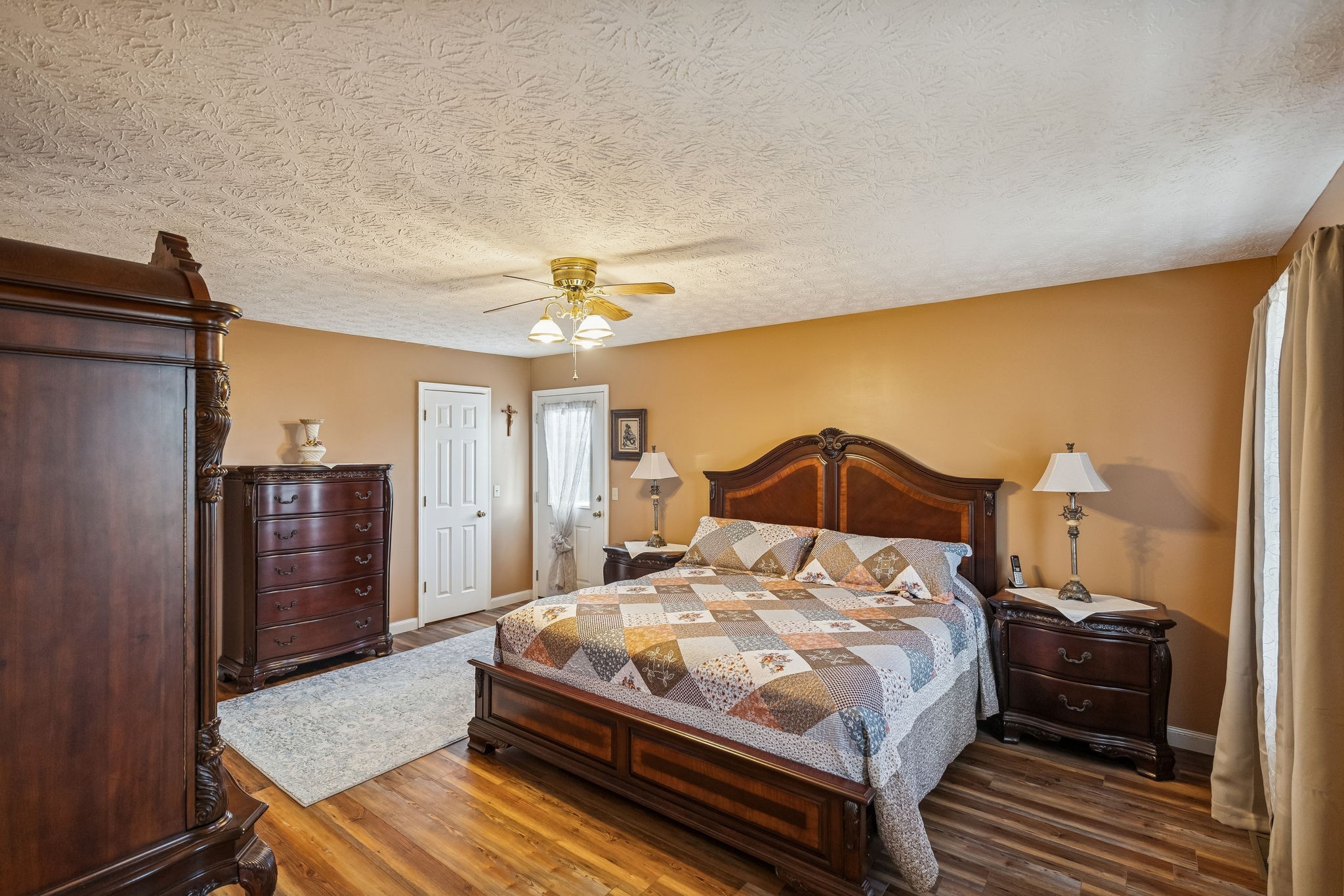 524 Willie Jarvis Road Sparta, TN 38583 - Photo 21 of 64 a bedroom with a bed and wooden floor