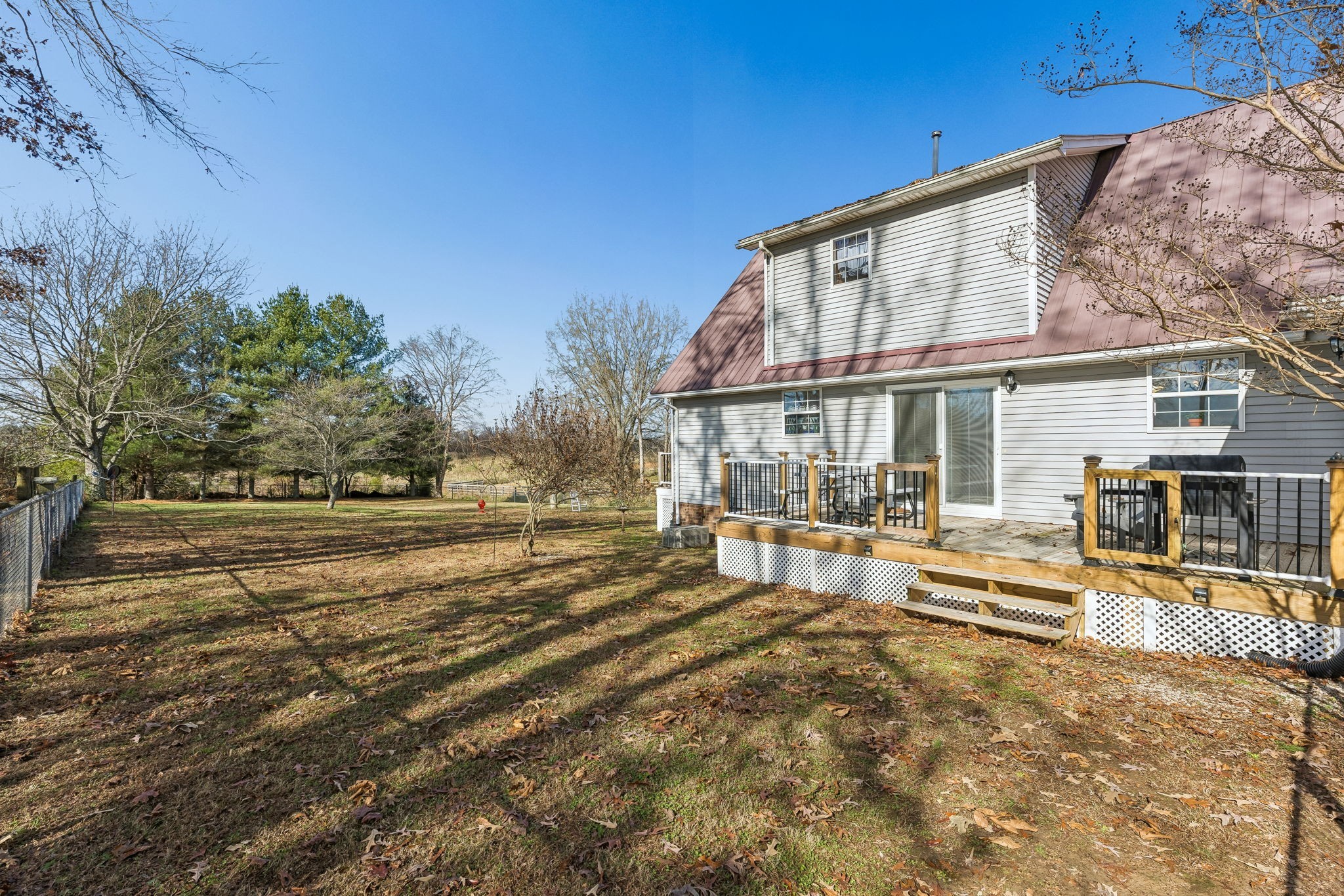 524 Willie Jarvis Road Sparta, TN 38583 - Photo 40 of 64 a view of a house with a yard and sitting area